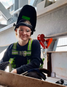 Kate Parr wearing welding protective gear